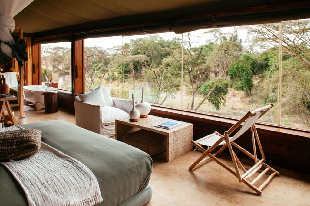 luxury safari lodge with bed and bath tub